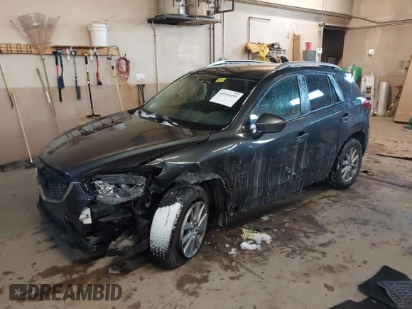 2015 Mazda CX-5 Touring with VIN JM3KE2CY2F0458114, listed as a IAAI auction lot 41545493 with 138,061 mi miles. Bid and sale history available at carsss.com. Image 2.