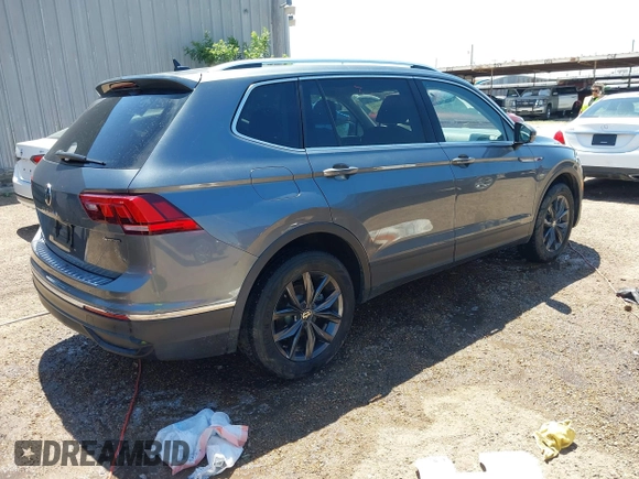 2023 Volkswagen Tiguan SE with VIN 3VVMB7AX4PM023080, listed as a IAAI auction lot 41963195 with 37,696 mi miles and . Bid and sale history available at DreamBid. Image 4.