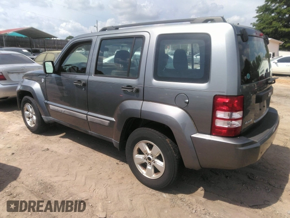 2012 Jeep Liberty Sport with VIN 1C4PJMAKXCW107531, listed as a IAAI auction lot 42155945 with 166,188 mi miles and . Bid and sale history available at carsss.com. Image 3.