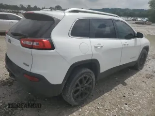 2014 Jeep Cherokee Latitude with VIN 1C4PJLCS3EW249262, listed as a Copart auction lot 56489135 with 195,264 mi miles and Clean Title. Bid and sale history available at DreamBid. Image 3.