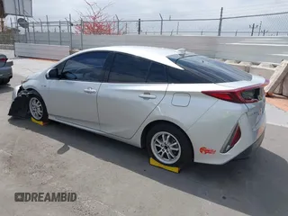 2017 Toyota Prius Plus z VIN JTDKARFPXH3053894, wystawiony jako IAAI lot #42208119 z przebiegiem 115 439 mil mil oraz . Historia ofert i sprzedaży dostępna na DreamBid. Obrazek 3.
