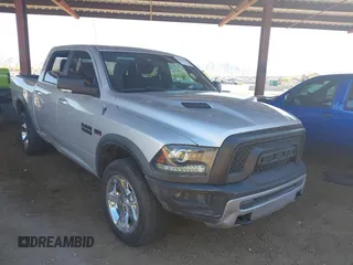 2017 Ram 1500 Rebel z VIN 1C6RR7YT9HS595619, wystawiony jako IAAI lot #41892988 z przebiegiem 115 388 mil mil oraz . Historia ofert i sprzedaży dostępna na DreamBid. Obrazek 1.