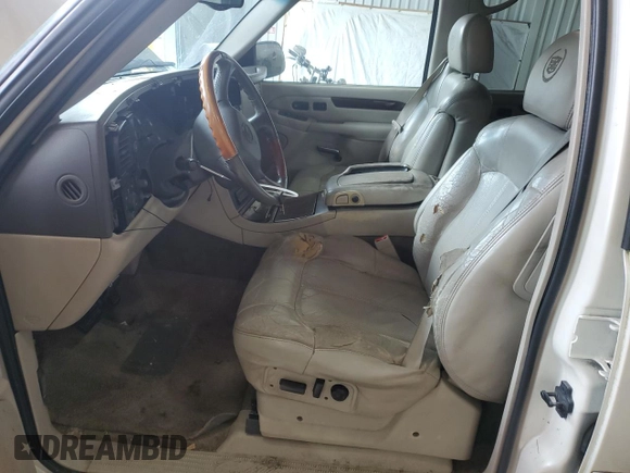 2002 Cadillac Escalade z VIN 1GYEC63T22R234266, wystawiony jako Copart lot #53041985 z przebiegiem 186 571 mil mil oraz Szkody całkowita. Historia ofert i sprzedaży dostępna na DreamBid. Obrazek 7.