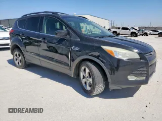 2014 Ford Escape SE z VIN 1FMCU9G91EUE51167, wystawiony jako Copart lot #50017325 z przebiegiem 216 062 mil mil oraz Czysty tytuł • Clean title. Historia ofert i sprzedaży dostępna na DreamBid. Obrazek 4.