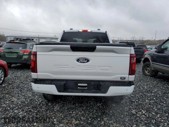2024 Ford F-150 STX with VIN 1FTEW2LP0RKD27766, listed as a Copart auction lot 52286875 with 9,880 mi miles and Salvage Title. Bid and sale history available at carsss.com. Image 6.