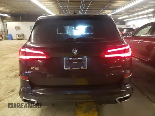 2019 BMW X5 xDrive50i with VIN 5UXJU2C55KLN67350, listed as a Copart auction lot 73114672 with 18,704 mi miles. Bid and sale history available at carsss.com. Image 6.