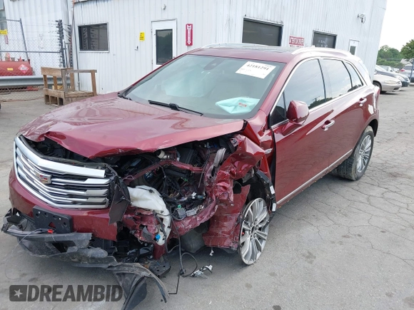 2017 Cadillac XT5 Luxury FWD z VIN 1GYKNBRS1HZ200882, wystawiony jako IAAI lot #42181291 z przebiegiem 95 687 mil mil oraz . Historia ofert i sprzedaży dostępna na DreamBid. Obrazek 17.