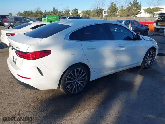 2022 BMW 2 Series 228i with VIN WBA53AK06N7K00232, listed as a IAAI auction lot 41620102 with 84,953 mi miles. Bid and sale history available at carsss.com. Image 4.