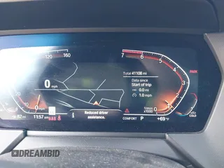 2021 BMW 2 Series 228i xDrive z VIN WBA73AK01M7G52079, wystawiony jako IAAI lot #41633040 z przebiegiem 41 108 mil mil oraz . Historia ofert i sprzedaży dostępna na DreamBid. Obrazek 7.