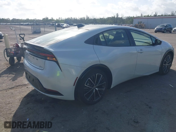 2024 Toyota Prius LE with VIN JTDACAAU1R3033846, listed as a IAAI auction lot 41704630 with 1,678 mi miles. Bid and sale history available at carsss.com. Image 4.