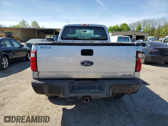 2012 Ford F-250 XL with VIN 1FTBF2B64CEA04600, listed as a Copart auction lot 54930025 with 127,925 mi miles and Salvage title. Bid and sale history available at DreamBid. Image 6.