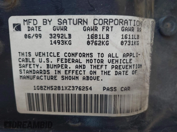 1999 Saturn SL z VIN 1G8ZH5281XZ376254, wystawiony jako IAAI lot #41857372 z przebiegiem 229 836 mil mil oraz . Historia ofert i sprzedaży dostępna na DreamBid. Obrazek 9.