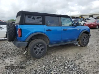 2021 Ford Bronco with VIN 1FMDE5BH9MLB02593, listed as a Copart auction lot 59632675 with 64,833 mi miles and Salvage title. Bid and sale history available at DreamBid. Image 3.