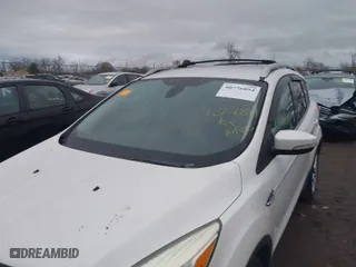 2015 Ford Escape Titanium with VIN 1FMCU9J95FUB91253, listed as a IAAI auction lot 40776894 with 146,855 mi miles. Bid and sale history available at carsss.com. Image 6.