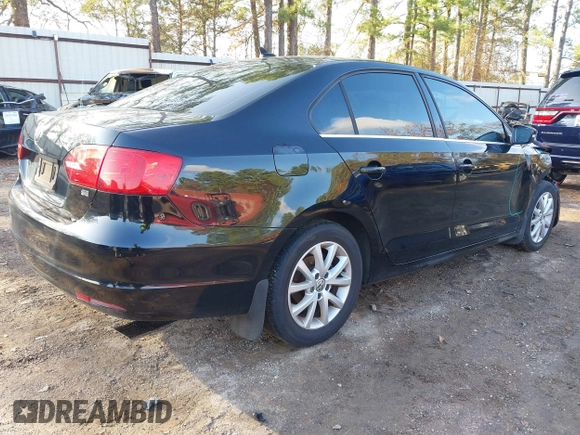 2014 Volkswagen Jetta Sedan SE w/Connectivity with VIN 3VWD07AJ8EM427848, listed as a IAAI auction lot 40988647 with 134,773 mi miles. Bid and sale history available at carsss.com. Image 4.