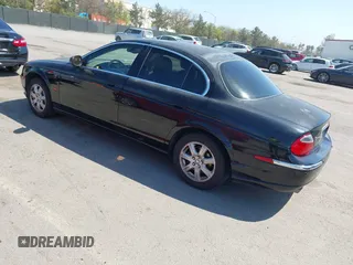 2003 Jaguar S-Type with VIN SAJEA01T13FM70486, listed as a IAAI auction lot 41989501 with 100,109 mi miles and . Bid and sale history available at DreamBid. Image 3.