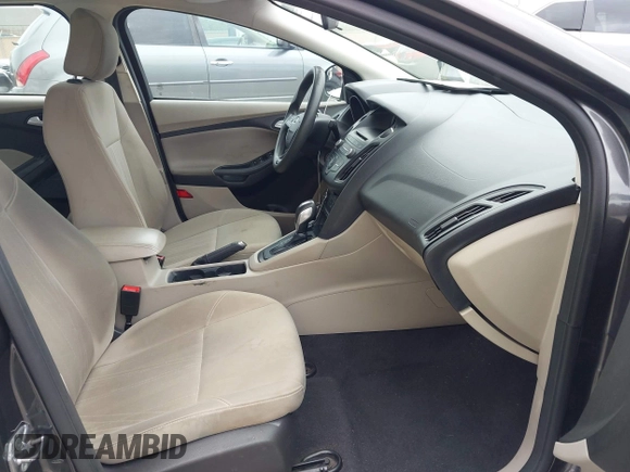 2015 Ford Focus SE with VIN 1FADP3F29FL342311, listed as a IAAI auction lot 42109683 with 70,579 mi miles. Bid and sale history available at carsss.com. Image 5.