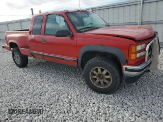 1999 GMC Sierra 2500 z VIN 1GTGK29R3XF020000, wystawiony jako Copart lot #53698755 z przebiegiem 241 366 mil mil oraz Szkody całkowita. Historia ofert i sprzedaży dostępna na DreamBid. Obrazek 4.