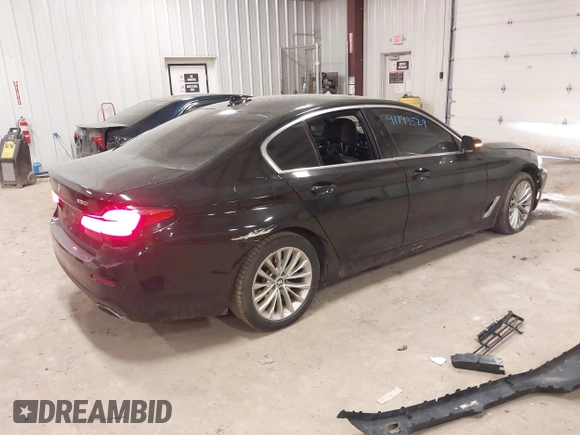 2021 BMW 5 Series 530i xDrive with VIN WBA13BJ09MCF64918, listed as a IAAI auction lot 41749529 with 90,076 mi miles and . Bid and sale history available at carsss.com. Image 4.