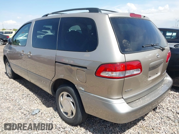 2002 Toyota Sienna LE with VIN 4T3ZF13CX2U500604, listed as a IAAI auction lot 41959768 with 139,668 mi miles. Bid and sale history available at carsss.com. Image 3.