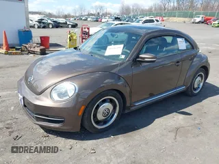 2013 Volkswagen Beetle 2.5L с VIN 3VWJP7AT1DM601306, выставлен на аукционе IAAI как лот 41846490 с пробегом 117 082 миль миль и . История ставок и продаж доступна на DreamBid. Изображение 17.