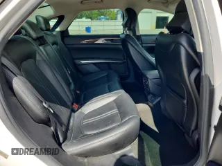 2016 Lincoln MKZ z VIN 3LN6L2G90GR616997, wystawiony jako Copart lot #62917525 z przebiegiem 194 744 mil mil oraz Szkoda całkowita • Salvage title. Historia ofert i sprzedaży dostępna na DreamBid. Obrazek 10.