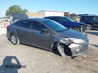 2013 Ford Focus S with VIN 1FADP3E24DL317766, listed as a IAAI auction lot 42029670 with 159,130 mi miles. Bid and sale history available at carsss.com. Image 1.