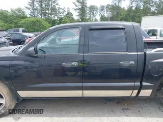 2005 Dodge Dakota SLT z VIN 1D7HE48N75S327041, wystawiony jako IAAI lot #42232145 z przebiegiem 229 467 mil mil oraz . Historia ofert i sprzedaży dostępna na DreamBid. Obrazek 14.