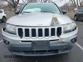 2014 Jeep Compass Sport with VIN 1C4NJDBB8ED734667, listed as a IAAI auction lot 41836914 with 221,028 mi miles. Bid and sale history available at carsss.com. Image 6.