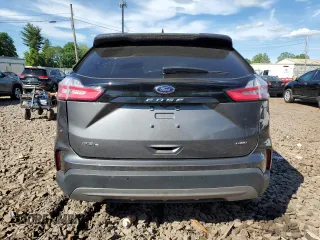 2024 Ford Edge SEL z VIN 2FMPK4J90RBA77908, wystawiony jako Copart lot #57846315 z przebiegiem 18 990 mil mil oraz Nie do naprawy. Historia ofert i sprzedaży dostępna na DreamBid. Obrazek 6.