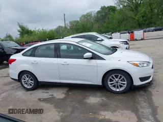 2018 Ford Focus SE with VIN 1FADP3F29JL223389, listed as a IAAI auction lot 42127707 with 87,145 mi miles and . Bid and sale history available at DreamBid. Image 14.