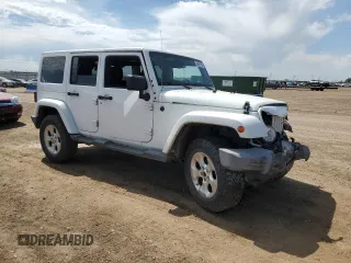 2014 Jeep Wrangler Unlimited Sahara with VIN 1C4BJWEG1EL210949, listed as a Copart auction lot 60977555 with 122,495 mi miles and Salvage title. Bid and sale history available at DreamBid. Image 4.