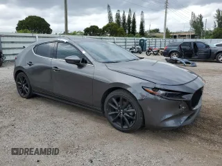 2022 Mazda Mazda3 Hatchback Premium with VIN JM1BPAMLXN1515412, listed as a Copart auction lot 76951614 with 0 mi miles and Salvage Title. Bid and sale history available at carsss.com. Image 4.
