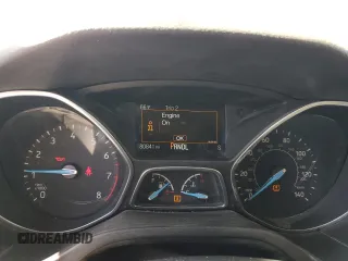 2018 Ford Focus SE z VIN 1FADP3F29JL206110, wystawiony jako Copart lot #53953515 z przebiegiem 80 841 mil mil oraz Szkoda całkowita • Salvage title. Historia ofert i sprzedaży dostępna na DreamBid. Obrazek 9.