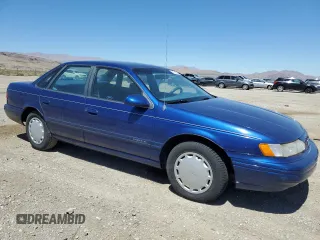 1994 Ford Taurus GL z VIN 1FALP5246RG126184, wystawiony jako Copart lot #67615014 z przebiegiem 95 189 mil mil oraz Szkoda całkowita • Salvage title. Historia ofert i sprzedaży dostępna na DreamBid. Obrazek 4.