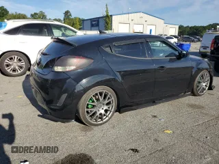 2012 Hyundai Veloster w/Gray Int с VIN KMHTC6AD6CU069051, выставлен на аукционе Copart как лот 57573825 с пробегом 19 222 миль миль и Списание • Salvage title. История ставок и продаж доступна на DreamBid. Изображение 3.