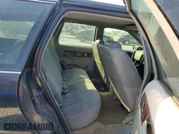 1996 Chevrolet Caprice with VIN 1G1BL82P2TR106404, listed as a Copart auction lot 74213214 with 156,588 mi miles and Salvage title. Bid and sale history available at DreamBid. Image 10.