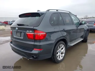2011 BMW X5 35i with VIN 5UXZV4C51BL414668, listed as a IAAI auction lot 41532939 with 108,552 mi miles. Bid and sale history available at carsss.com. Image 4.