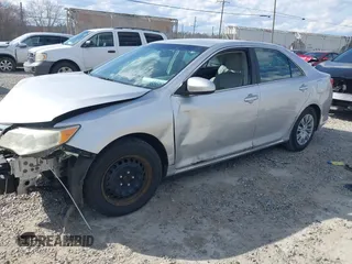 2014 Toyota Camry L with VIN 4T1BF1FK3EU301041, listed as a IAAI auction lot 41858386 with 136,998 mi miles and . Bid and sale history available at DreamBid. Image 21.