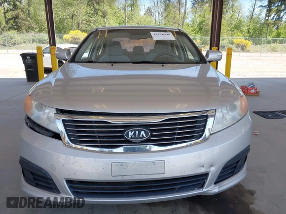 2009 Kia Optima LX z VIN KNAGE228795357008, wystawiony jako IAAI lot #42228948 z przebiegiem 148 194 mil mil oraz . Historia ofert i sprzedaży dostępna na DreamBid. Obrazek 12.