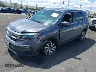 2021 Honda Pilot EX-L with VIN 5FNYF5H57MB046740, listed as a IAAI auction lot 41943366 with 31,198 mi miles and . Bid and sale history available at DreamBid. Image 2.