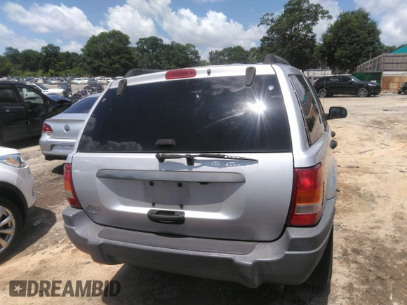 2004 Jeep Grand Cherokee Laredo z VIN 1J4GW48SX4C309998, wystawiony jako IAAI lot #42307167 z przebiegiem 306 912 mil mil oraz . Historia ofert i sprzedaży dostępna na DreamBid. Obrazek 16.