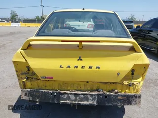 2002 Mitsubishi Lancer OZ-Rally z VIN JA3AJ86EX2U073129, wystawiony jako IAAI lot #42337379 z przebiegiem 257 556 mil mil oraz . Historia ofert i sprzedaży dostępna na DreamBid. Obrazek 17.