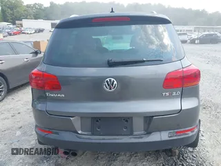 2014 Volkswagen Tiguan SE z VIN WVGAV3AX0EW576108, wystawiony jako IAAI lot #42405804 z przebiegiem 117 530 mil mil oraz . Historia ofert i sprzedaży dostępna na DreamBid. Obrazek 16.