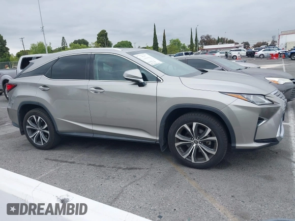 2018 Lexus RX 350 with VIN 2T2ZZMCA2JC098105, listed as a IAAI auction lot 42200869 with 52,323 mi miles and . Bid and sale history available at DreamBid. Image 13.