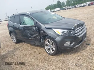 2019 Ford Escape Titanium with VIN 1FMCU0J97KUA34281, listed as a IAAI auction lot 42409579 with 52,378 mi miles and . Bid and sale history available at DreamBid. Image 1.