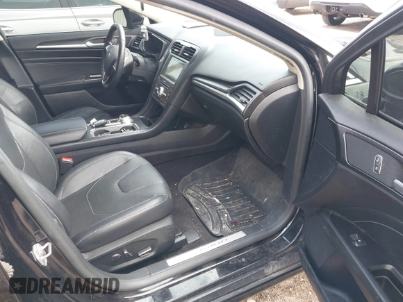 2019 Ford Fusion Hybrid Titanium with VIN 3FA6P0RU4KR144445, listed as a IAAI auction lot 42059840 with 90,617 mi miles. Bid and sale history available at carsss.com. Image 5.