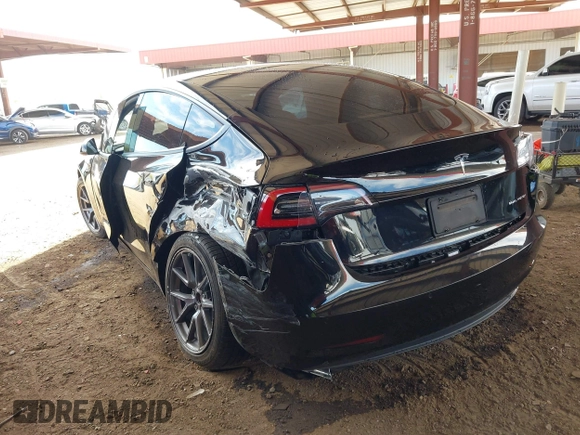 2022 Tesla Model 3 Long Range with VIN 5YJ3E1EB3NF257077, listed as a IAAI auction lot 42086629 with Not Provided miles and . Bid and sale history available at DreamBid. Image 3.