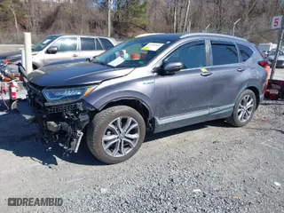 2020 Honda CR-V Hybrid Touring with VIN 7FART6H97LE024715, listed as a IAAI auction lot 41754582 with 67,498 mi miles. Bid and sale history available at carsss.com. Image 2.