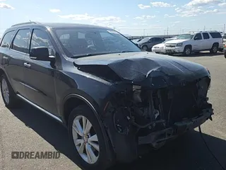 2013 Dodge Durango Crew z VIN 1C4RDJDGXDC672239, wystawiony jako Copart lot #59227905 z przebiegiem 167 982 mil mil oraz Szkoda całkowita • Salvage title. Historia ofert i sprzedaży dostępna na DreamBid. Obrazek 15.